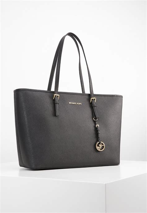 michael kors jet set black handbag|michael kors jet set pouch.